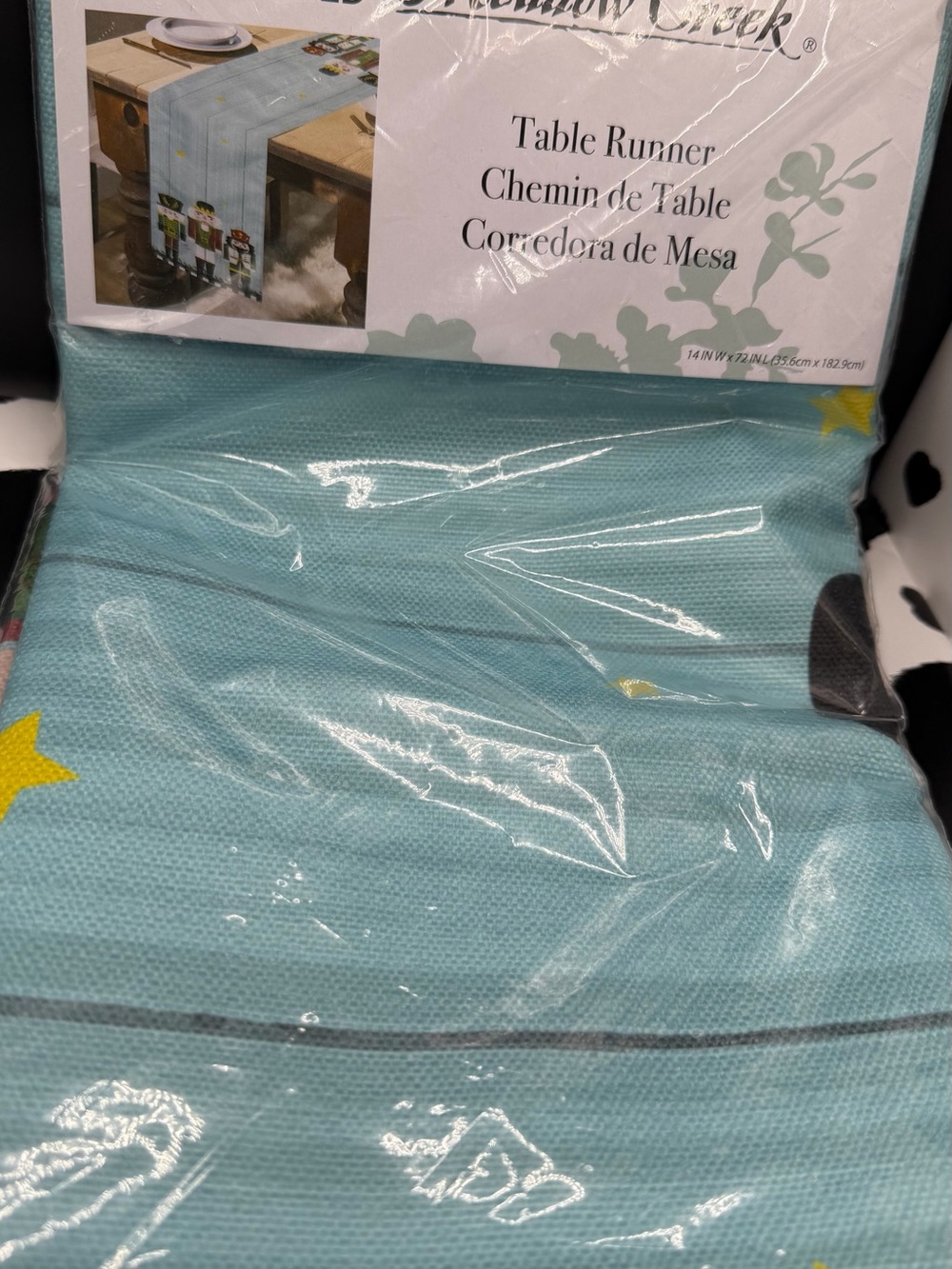 The Meadow Creek 14x72 inch Table Runner in Aqua with Nutcrackers